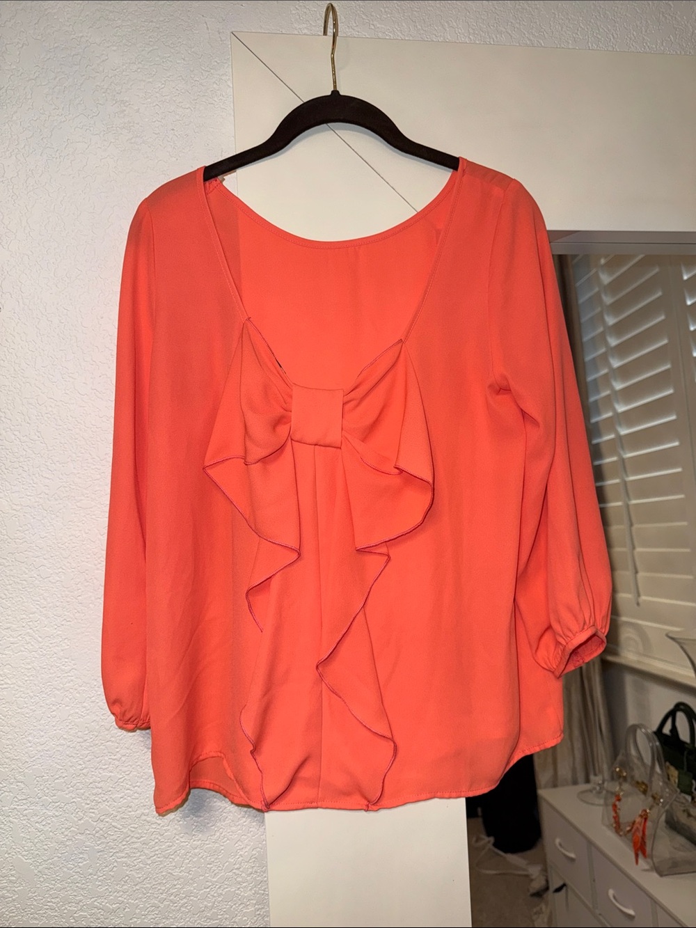 Necessary Clothing Coral Ruffle Bow Back Blouse